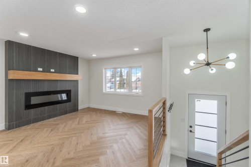 10309 167A Avenue, Edmonton, AB - Indoor Photo Showing Living Room With Fireplace