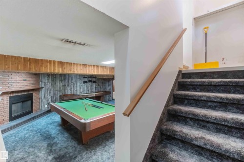 4130 134A Avenue, Edmonton, AB - Indoor Photo Showing Other Room With Fireplace