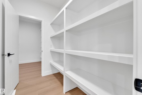 View of pantry - 733 Astoria Way, Devon, AB - Indoor With Storage