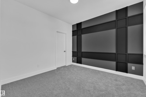 Unfurnished bedroom with carpet and baseboards - 733 Astoria Way, Devon, AB - Indoor Photo Showing Other Room
