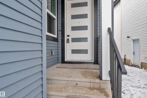 Doorway to property - 733 Astoria Way, Devon, AB - Outdoor With Exterior