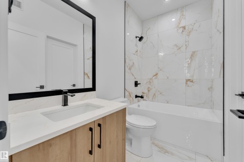 Bathroom featuring shower / bathtub combination, vanity, marble finish floors, and recessed lighting - 737 Astoria Way, Devon, AB - Indoor Photo Showing Bathroom