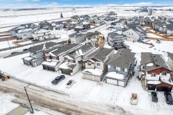Snowy aerial view featuring a residential view - 