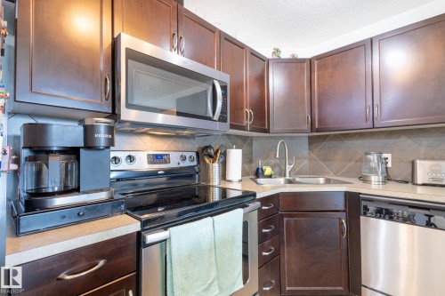 5951 165 Avenue, Edmonton, AB - Indoor Photo Showing Kitchen With Stainless Steel Kitchen With Double Sink