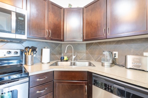 5951 165 Avenue, Edmonton, AB - Indoor Photo Showing Kitchen With Double Sink