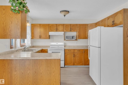 513 16 Street, Cold Lake, AB - Indoor Photo Showing Kitchen With Double Sink