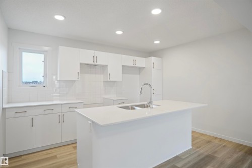 7062 Rosenthal Drive, Edmonton, AB - Indoor Photo Showing Kitchen With Double Sink