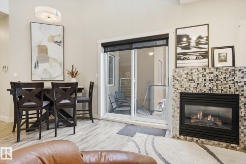 618 10235 112 Street, Edmonton, AB - Indoor Photo Showing Living Room With Fireplace