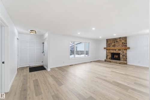15016 57 Street, Edmonton, AB - Indoor Photo Showing Living Room With Fireplace
