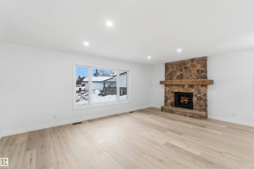 15016 57 Street, Edmonton, AB - Indoor Photo Showing Living Room With Fireplace