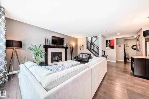 7014 170A Avenue, Edmonton, AB - Indoor Photo Showing Living Room With Fireplace