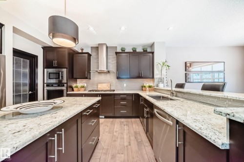 7014 170A Avenue, Edmonton, AB - Indoor Photo Showing Kitchen With Double Sink With Upgraded Kitchen