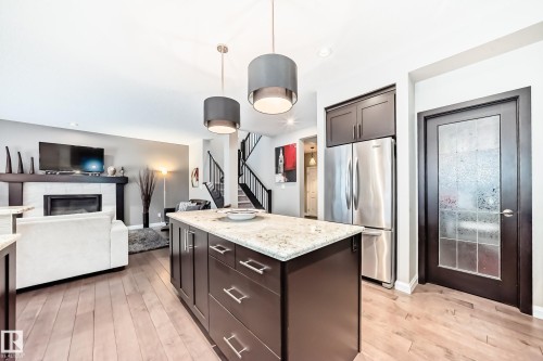 7014 170A Avenue, Edmonton, AB - Indoor Photo Showing Kitchen With Fireplace