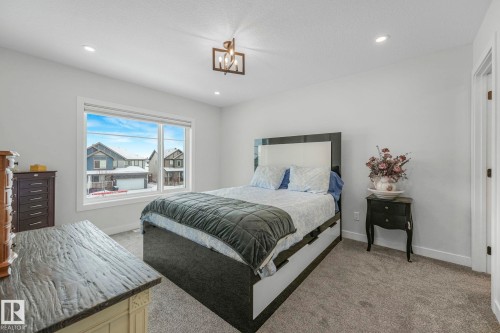 Bedroom with light carpet and recessed lighting - 21 Sienna Boulevard, Fort Saskatchewan, AB - Indoor Photo Showing Bedroom