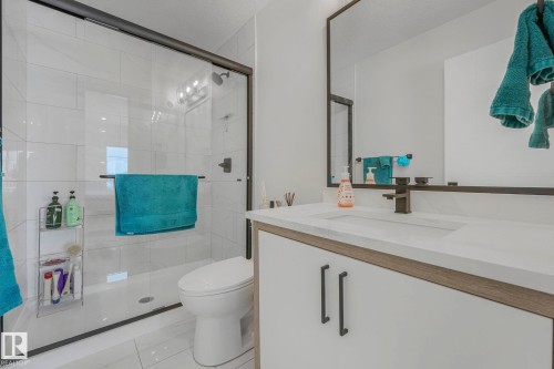 Full bathroom featuring vanity and a stall shower - 21 Sienna Boulevard, Fort Saskatchewan, AB - Indoor Photo Showing Bathroom