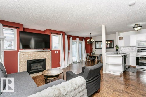 3 20 Deerbourne Drive, St. Albert, AB - Indoor With Fireplace