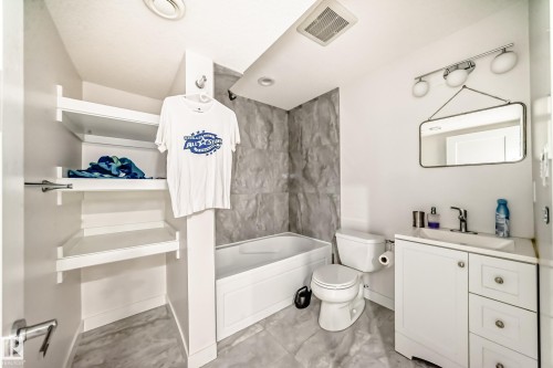 Bathroom with vanity and shower / bathtub combination - 5814 165 Avenue, Edmonton, AB - Indoor Photo Showing Bathroom