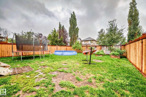 106 Rue Monique, Beaumont, AB - Outdoor With Backyard