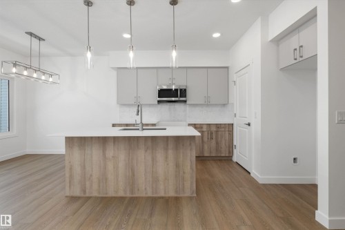 20820 40 Avenue, Edmonton, AB - Indoor Photo Showing Kitchen With Upgraded Kitchen