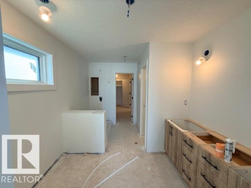 Bathroom featuring vanity - 16512 34 Avenue, Edmonton, AB - Indoor Photo Showing Other Room