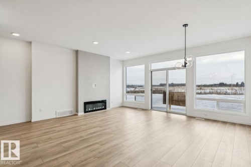 22927 80 Avenue, Edmonton, AB - Indoor Photo Showing Other Room With Fireplace