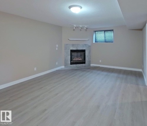 16407 81 Street, Edmonton, AB - Indoor Photo Showing Living Room With Fireplace