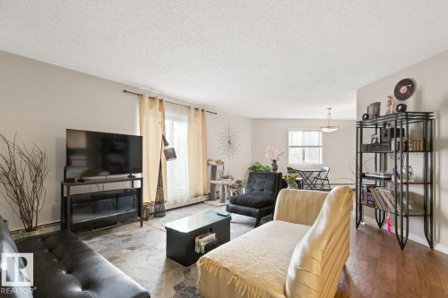 308 6310 101 Avenue, Edmonton, AB - Indoor Photo Showing Living Room