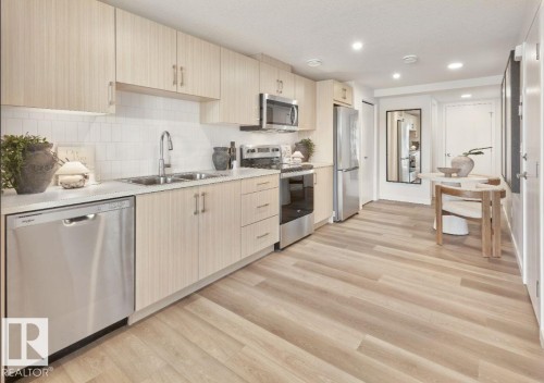 4546 Kinsella Link, Edmonton, AB - Indoor Photo Showing Kitchen With Stainless Steel Kitchen With Double Sink With Upgraded Kitchen