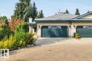 View of front facade featuring a chimney, concrete driveway, a garage, roof with shingles, and stucco siding - 112 Haddow Close, Edmonton, AB  - Outdoor 