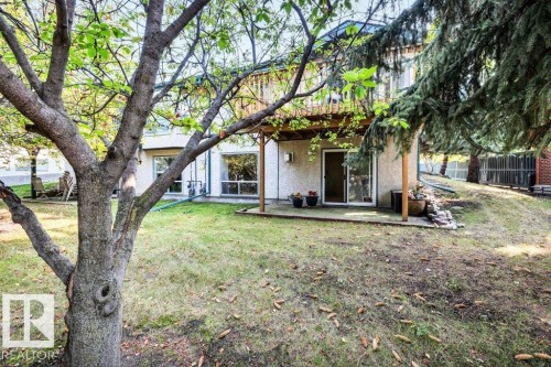 Back of property with stucco siding and a patio - 112 Haddow Close, Edmonton, AB - Outdoor