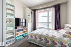 Bedroom with dark wood-style floors - 