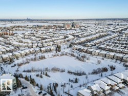 Snowy aerial view with a residential view - 