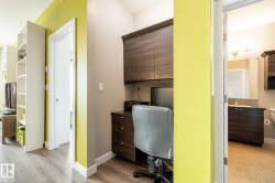 Home office with baseboards and light wood-style floors - 