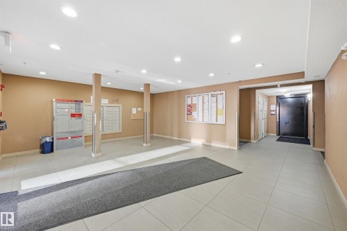 207 1080 Mcconachie Boulevard, Edmonton, AB - Indoor Photo Showing Other Room