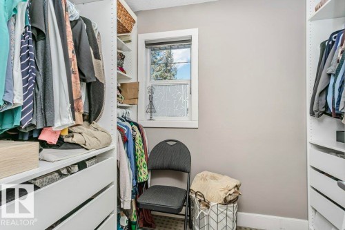 View of walk in closet - 1579 Hector Road, Edmonton, AB - Indoor With Storage