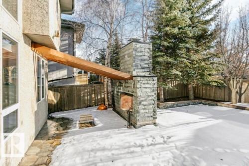 Fenced backyard with a patio area - 1579 Hector Road, Edmonton, AB - Outdoor