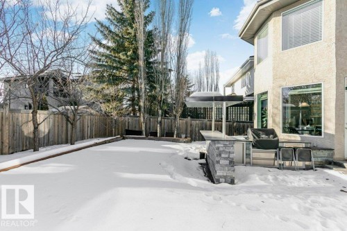 Fenced backyard with a patio - 1579 Hector Road, Edmonton, AB - Outdoor