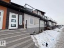 View of snow covered property entrance - 2748 Blatchford Road, Edmonton, AB  - Outdoor 