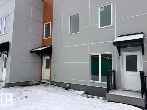 View of snow covered house - 2750 Blatchford Road, Edmonton, AB - Outdoor With Exterior