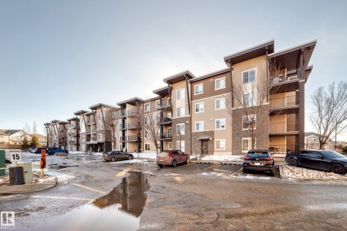 View of apartment building / complex featuring uncovered parking - 302 530 Watt Boulevard Sw, Edmonton, AB - Outdoor With Balcony With Facade
