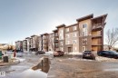 View of apartment building / complex featuring uncovered parking - 302 530 Watt Boulevard Sw, Edmonton, AB  - Outdoor With Balcony With Facade 