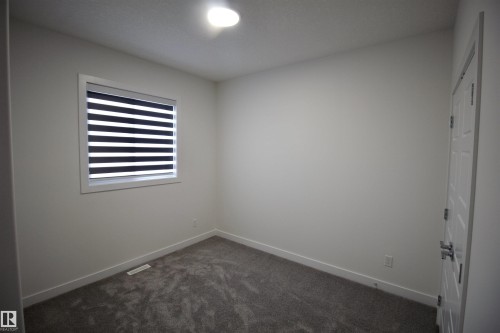 261 Munn Way, Leduc, AB - Indoor Photo Showing Other Room