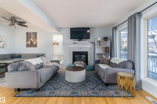 2309 39 Avenue Nw, Edmonton, AB - Indoor Photo Showing Living Room With Fireplace