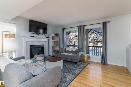 2309 39 Avenue Nw, Edmonton, AB - Indoor Photo Showing Living Room With Fireplace