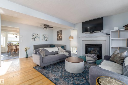 2309 39 Avenue Nw, Edmonton, AB - Indoor Photo Showing Living Room With Fireplace