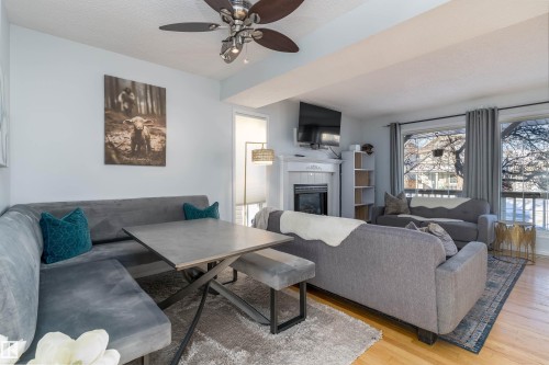 2309 39 Avenue Nw, Edmonton, AB - Indoor Photo Showing Living Room With Fireplace