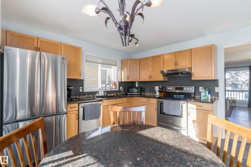 2309 39 Avenue Nw, Edmonton, AB - Indoor Photo Showing Kitchen With Double Sink