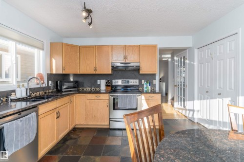 2309 39 Avenue Nw, Edmonton, AB - Indoor Photo Showing Kitchen With Double Sink