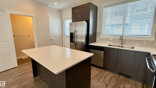 903 Crystallina Nera Way, Edmonton, AB - Indoor Photo Showing Kitchen With Double Sink