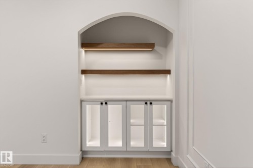 Detailed view of wood finished floors and baseboards - 9 Elwyck Gate, Spruce Grove, AB - Indoor Photo Showing Other Room